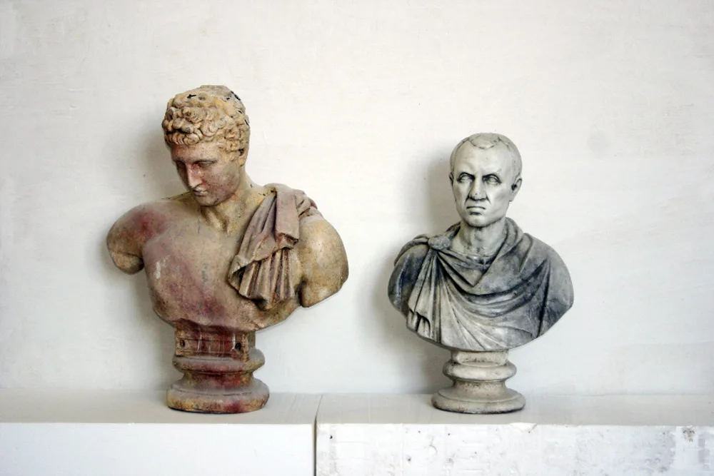 Busti greci marmorizzati coppia