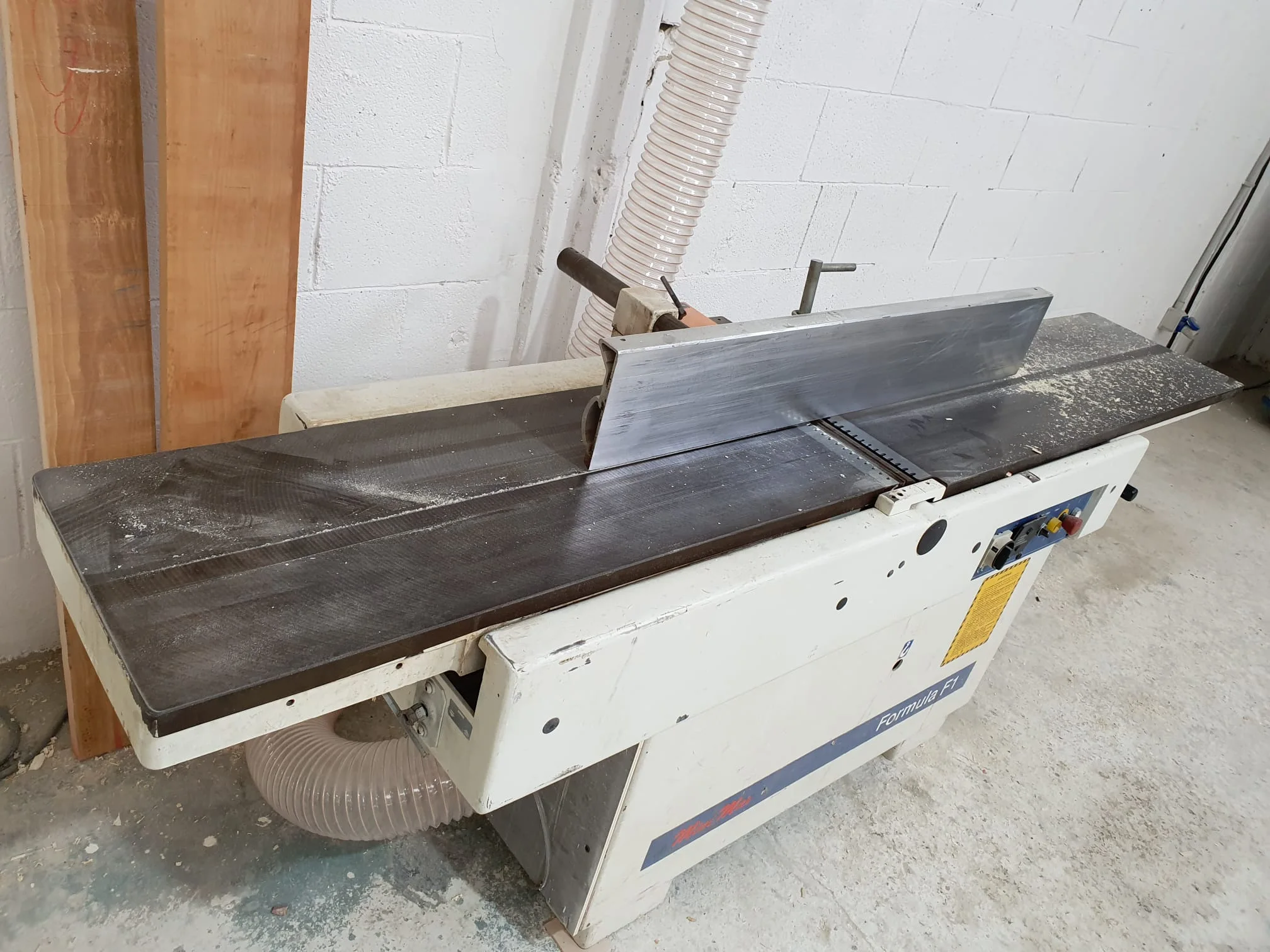 Detail of plywood assembly for scenography, screws, brackets, scaffold under construction