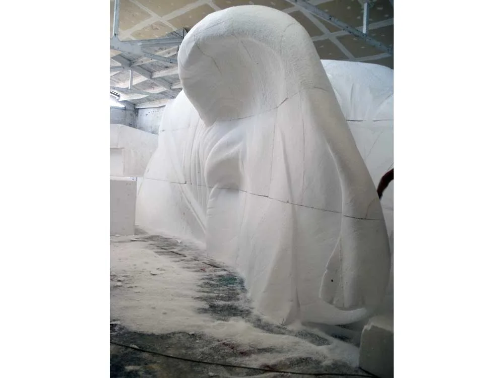 Detail of the elephant's skin sculpted in polystyrene: undulations and folds, hand finishing work