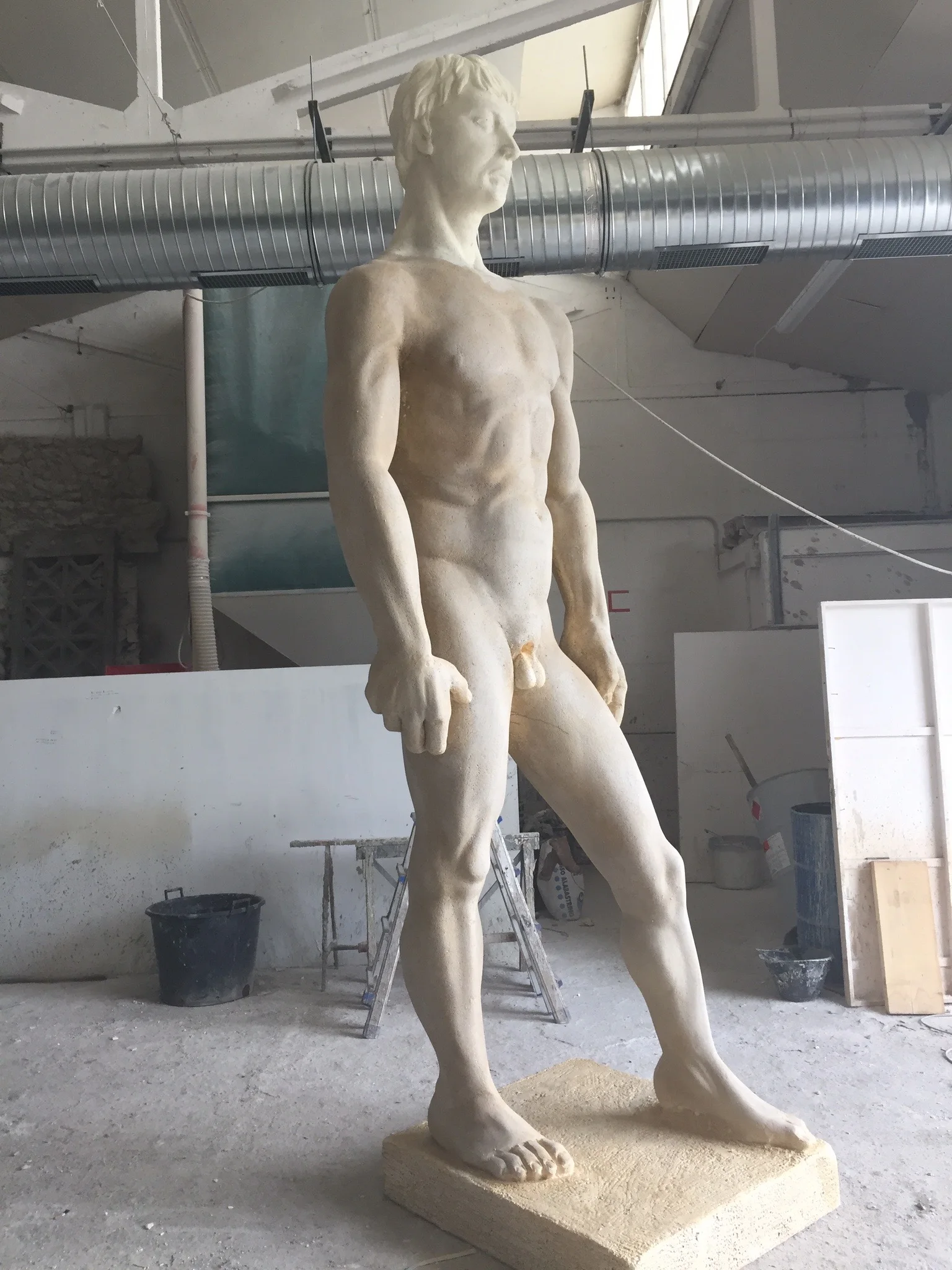 Polykleitos's Doryphoros in our workshops during fabrication: life-size fibreglass copy of the Greek canon, chiastic pose, ivory finish in its final stage