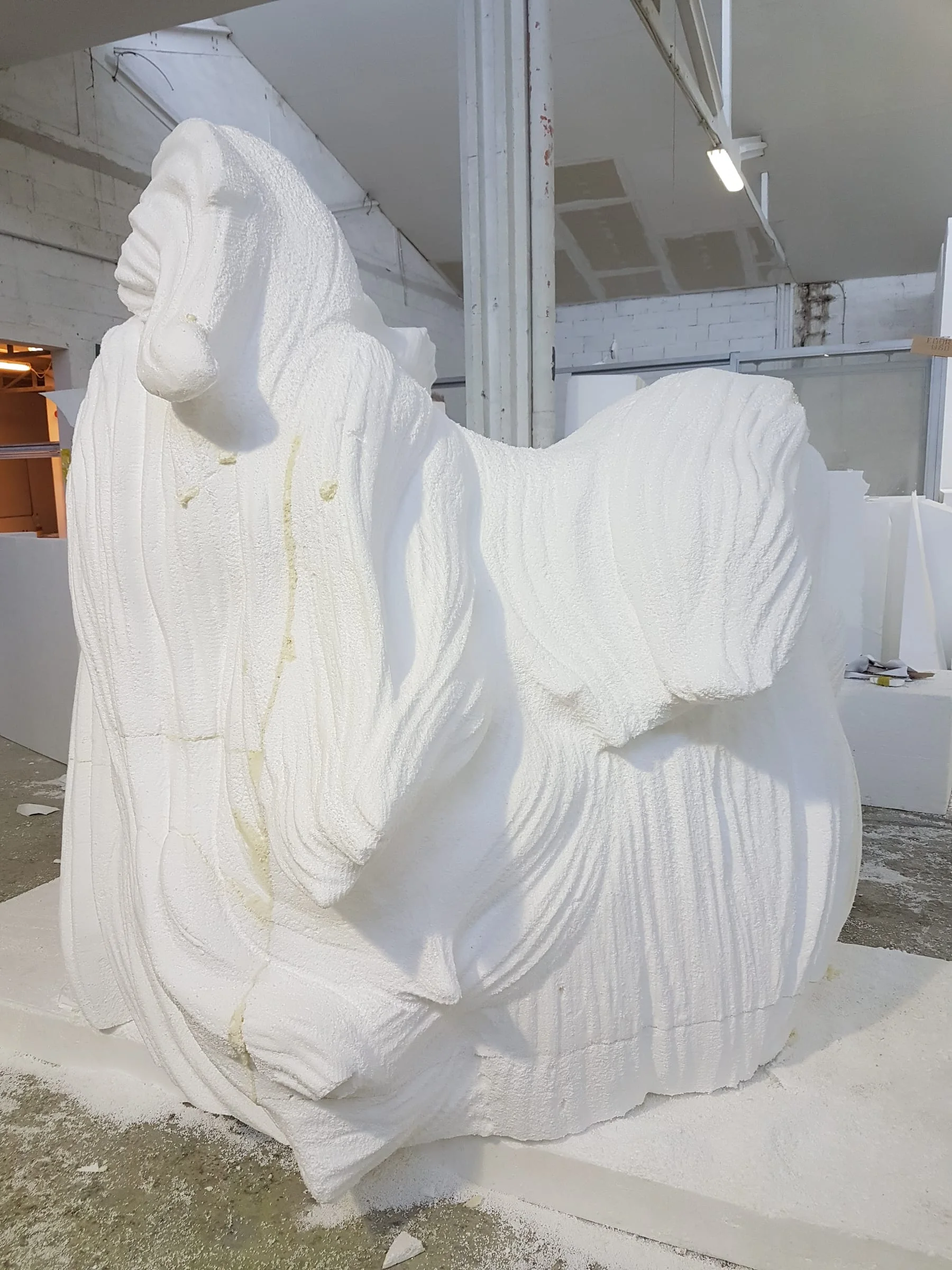 Monumental scenographic piece just out of robot milling, ready for the manual finishing phase