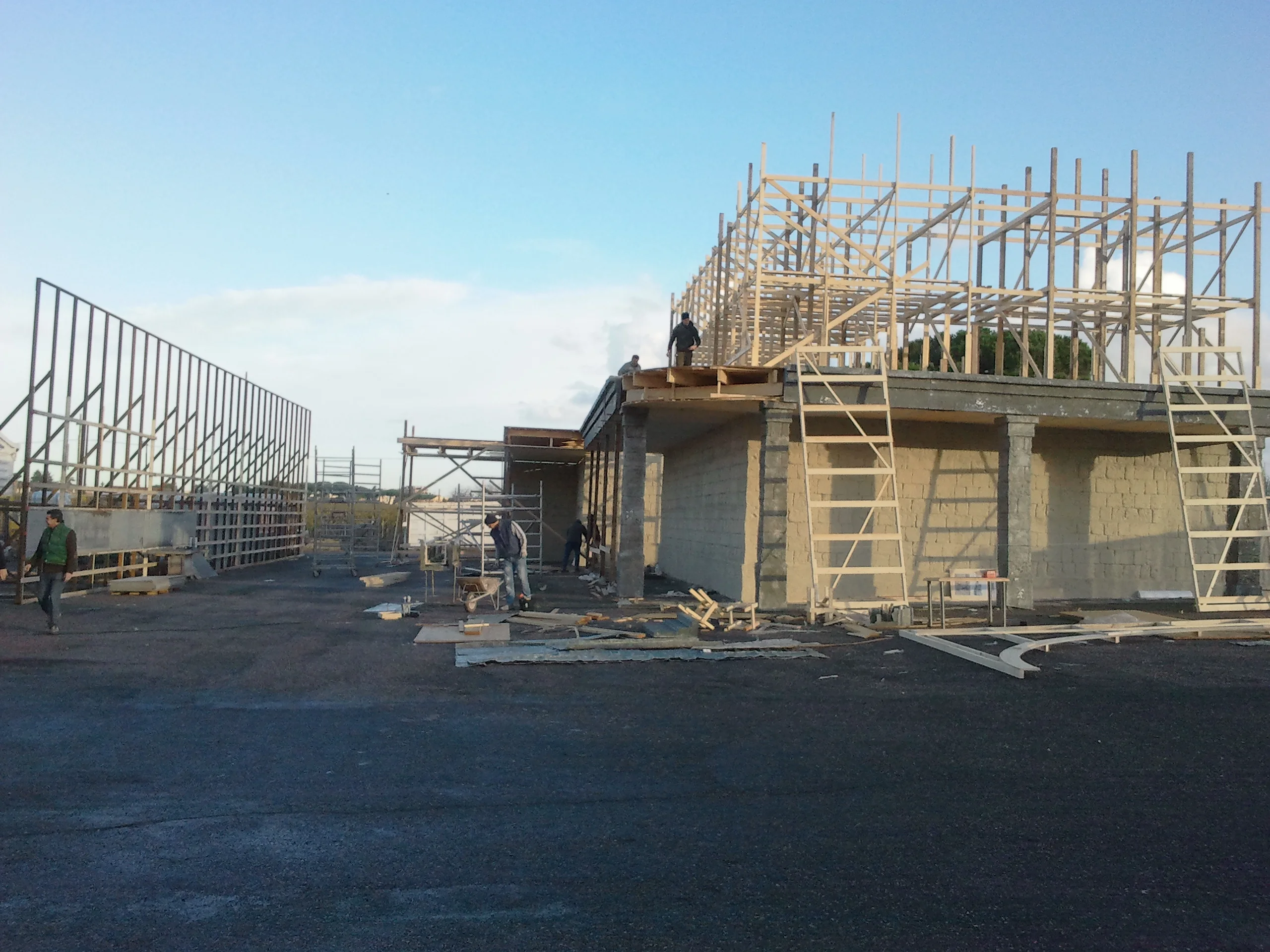 Close-up view of the wooden structure of the Peroni set, scaffold details, horizontal and vertical members